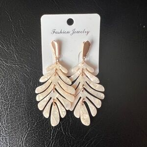 Earrings—ivory leaf with gold tones
